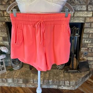 AnyBody Women's Athletic Shorts in Coral